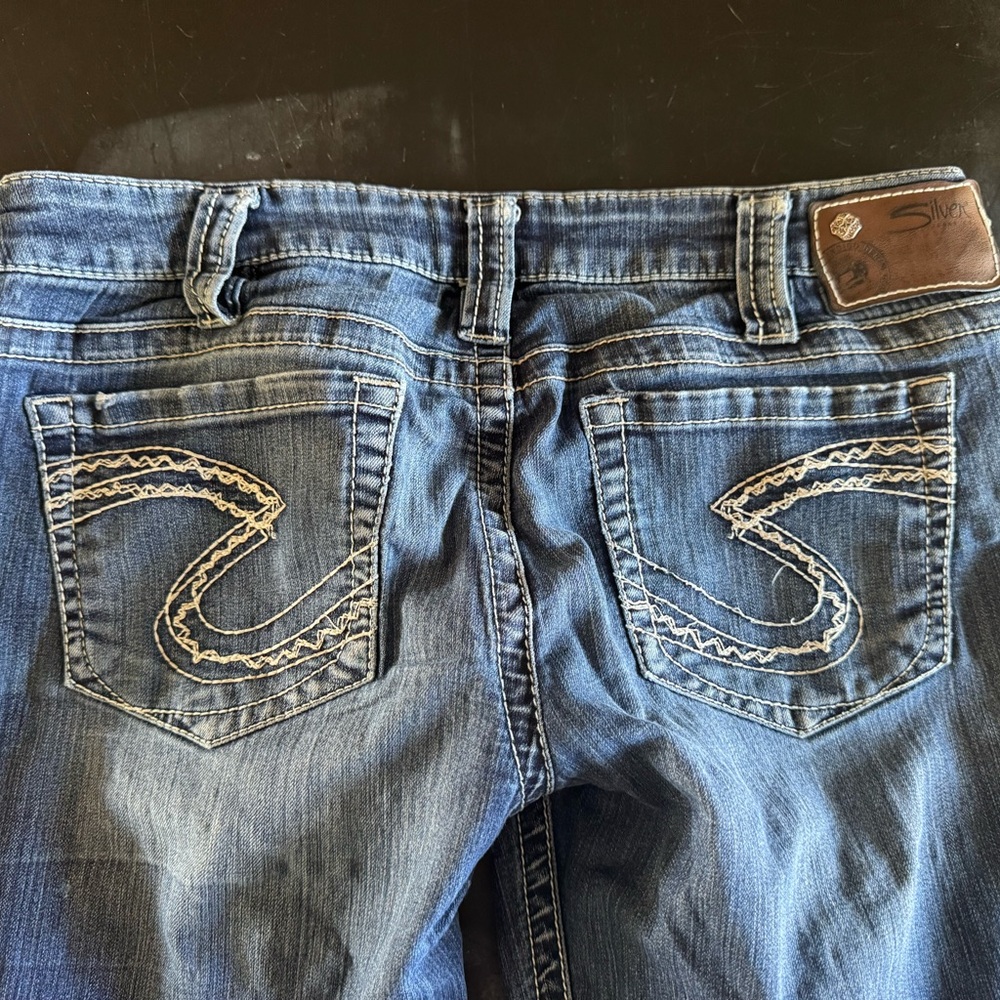 Silver Jeans Blue Boot Cut Denim with Signature Stitching
